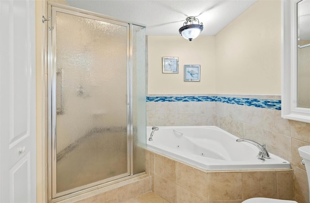 bathroom featuring tile patterned floors, toilet, and shower with separate bathtub