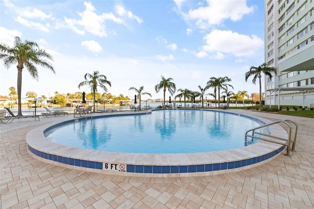 view of pool featuring a patio