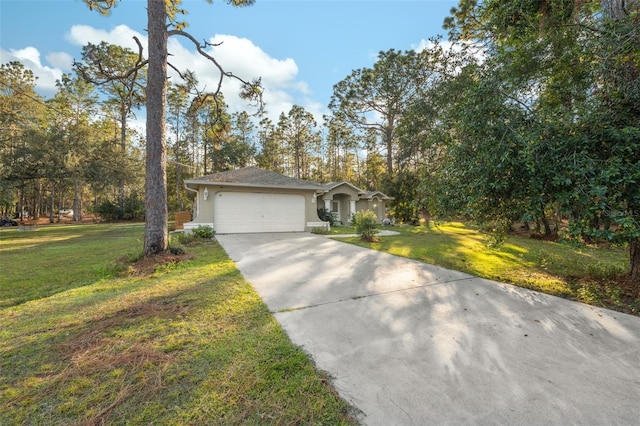 view of front of property with a front yard and a garage