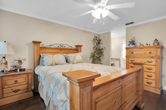 bedroom with dark hardwood / wood-style floors, ensuite bath, ceiling fan, and ornamental molding