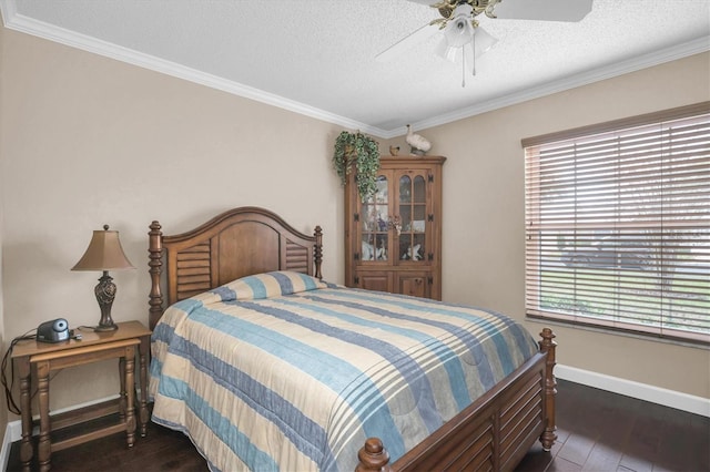 bedroom featuring multiple windows, dark hardwood / wood-style flooring, and ceiling fan