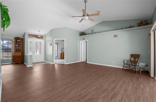 unfurnished living room with vaulted ceiling, ceiling fan, and dark hardwood / wood-style floors