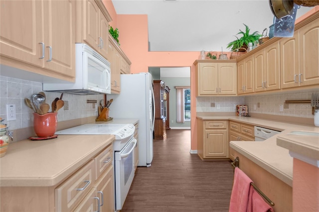 kitchen featuring dark hardwood / wood-style floors, light brown cabinets, decorative backsplash, and white appliances