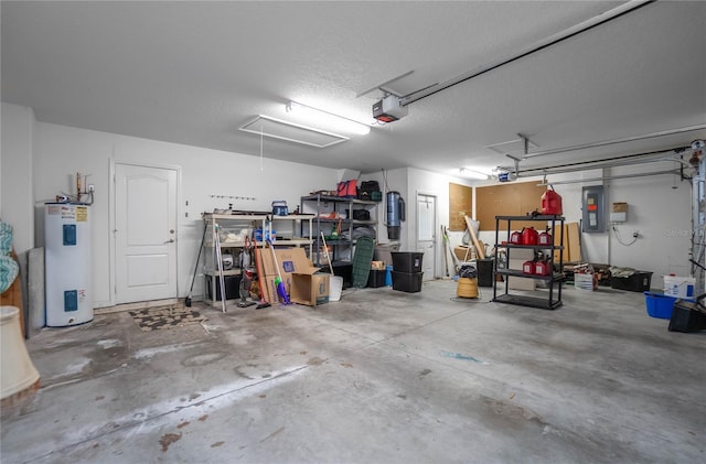 garage featuring electric water heater, electric panel, and a garage door opener