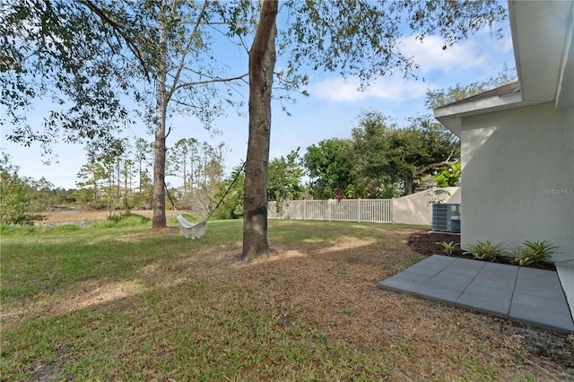 view of yard with a patio area and central AC