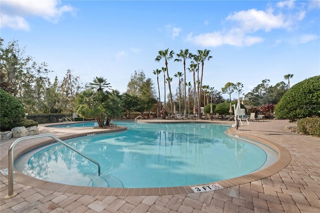 view of swimming pool featuring a patio