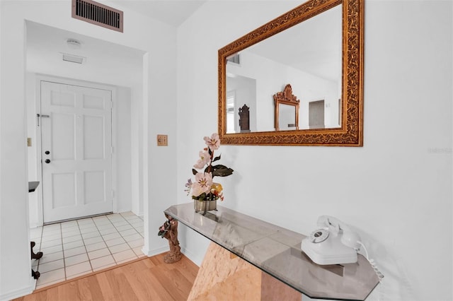 entrance foyer with light wood-type flooring