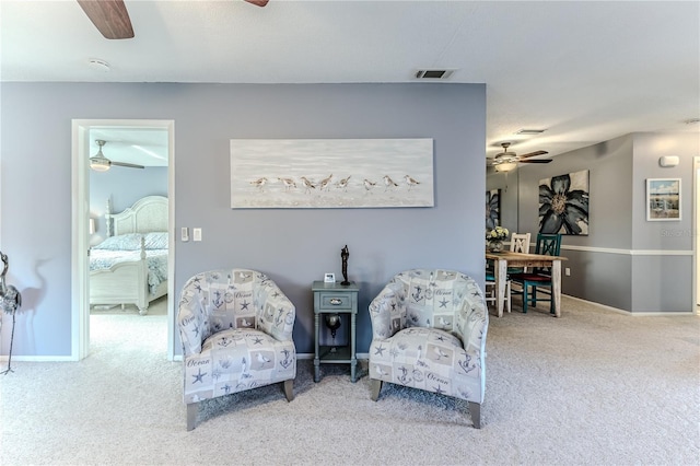 12814 Wedgewood Way Unit C, Hudson, FL 34667 - living area with a ceiling fan and carpet flooring