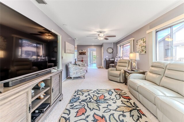 12814 Wedgewood Way Unit C, Hudson, FL 34667 - living area with a ceiling fan and carpet