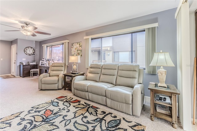 12814 Wedgewood Way Unit C, Hudson, FL 34667 - living area featuring healthy amount of natural light, light colored carpet, ceiling fan, and a desk