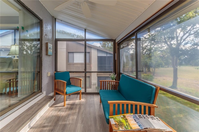 12814 Wedgewood Way Unit C, Hudson, FL 34667 - sunroom / solarium with a ceiling fan, lofted ceiling, and outdoor lounge area