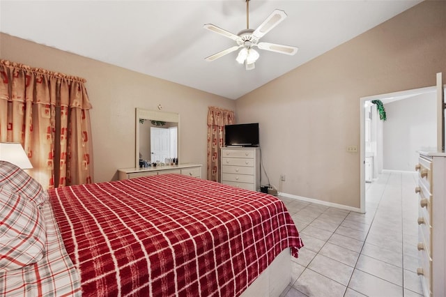 tiled bedroom featuring ceiling fan and vaulted ceiling