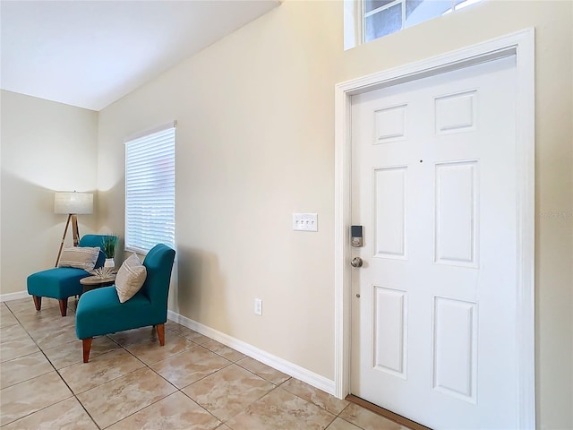 interior space with light tile patterned floors