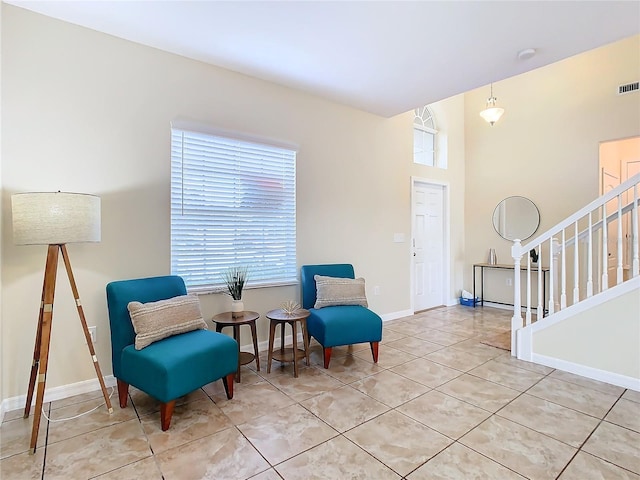 living area with light tile patterned flooring