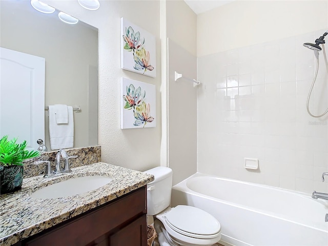 full bathroom featuring vanity, shower / bath combination, and toilet