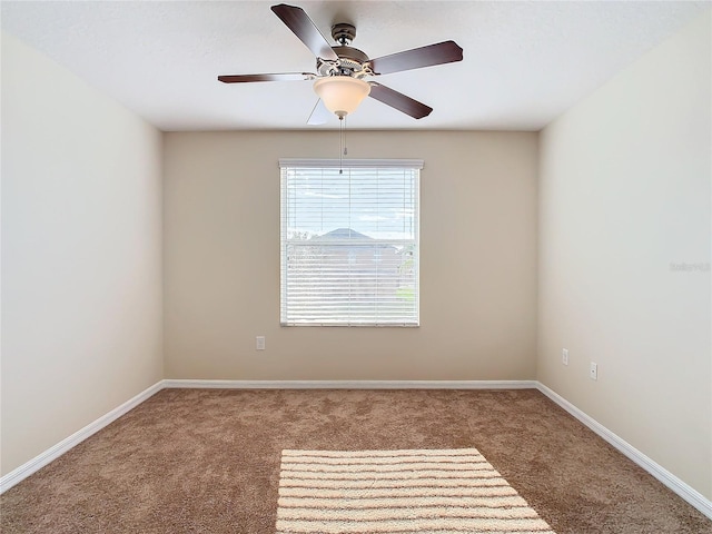 unfurnished room featuring carpet floors and ceiling fan