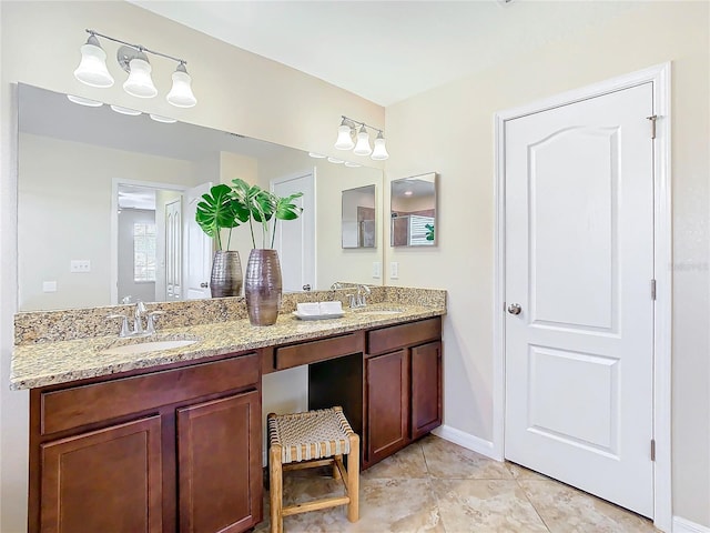 bathroom featuring tile patterned floors and vanity