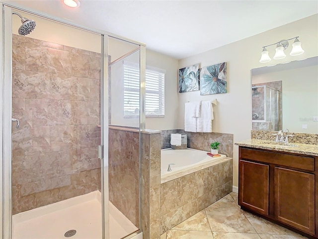 bathroom featuring separate shower and tub and vanity