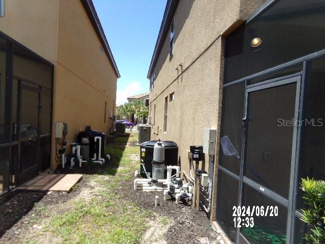 5537 Misty Oak Cir, Davenport, FL 33837 - view of property exterior featuring stucco siding