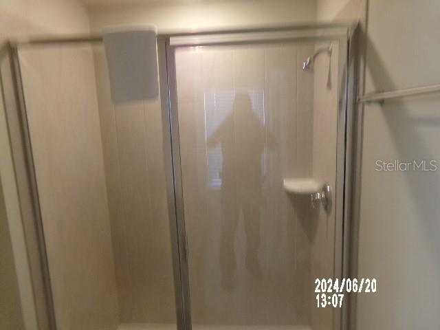 5537 Misty Oak Cir, Davenport, FL 33837 - full bath featuring a stall shower