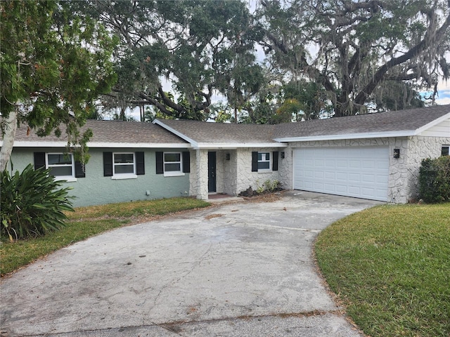 single story home featuring a garage