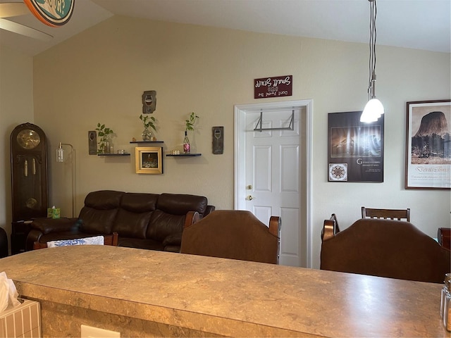 dining area with vaulted ceiling