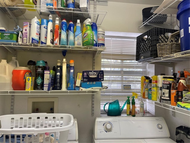 laundry room featuring washer / dryer