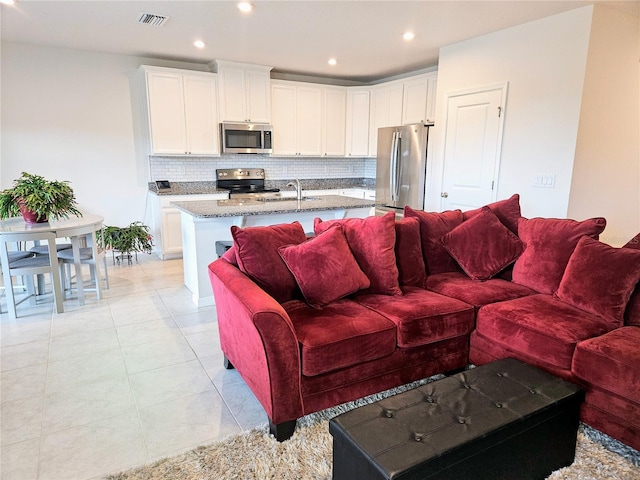 tiled living room with sink