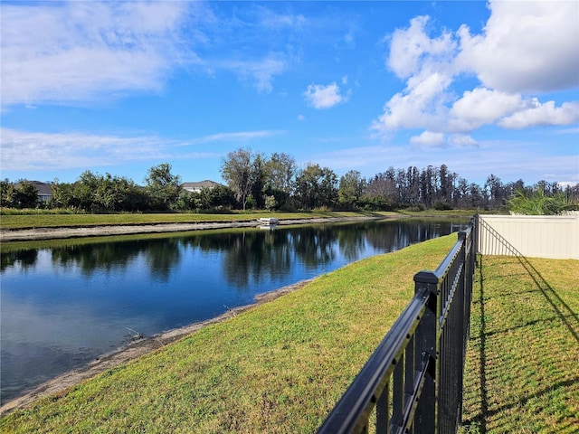 view of water feature featuring fence