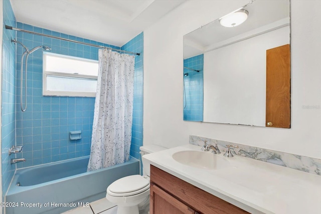 full bathroom featuring tile patterned flooring, shower / bath combination with curtain, toilet, and vanity