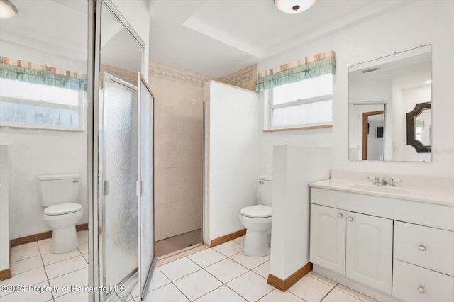 bathroom with tile patterned floors, vanity, an enclosed shower, and toilet