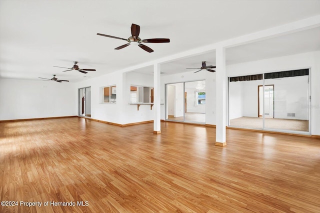 unfurnished living room featuring light hardwood / wood-style flooring