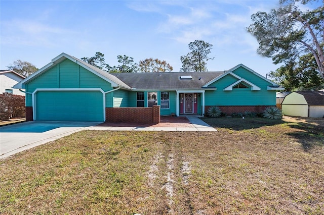 view of front of property featuring a garage and a front lawn