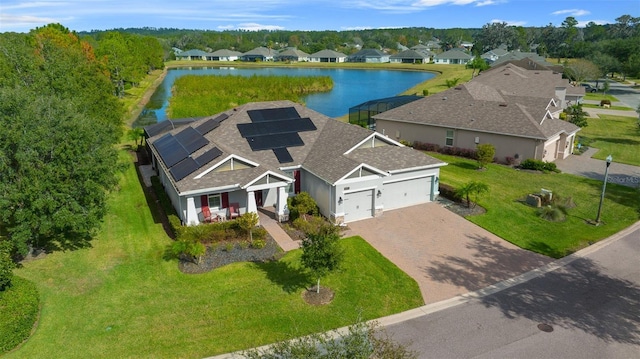 drone / aerial view with a water view