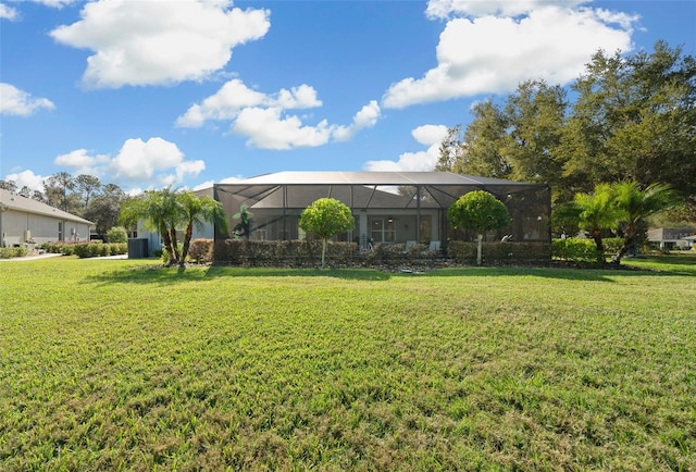 view of front facade featuring a lanai and a front lawn