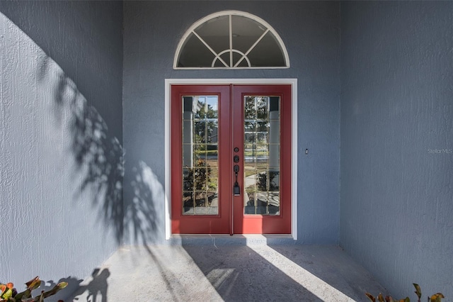 doorway to property featuring french doors