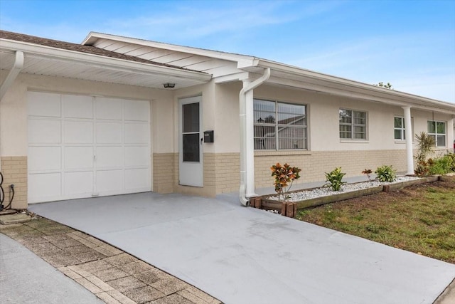 ranch-style home with a garage