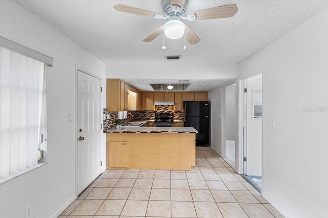 kitchen featuring backsplash, ceiling fan, sink, black appliances, and light brown cabinets