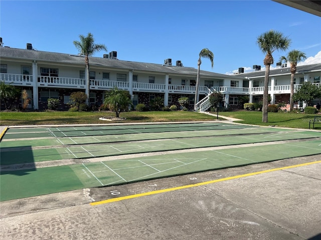 view of community featuring a lawn