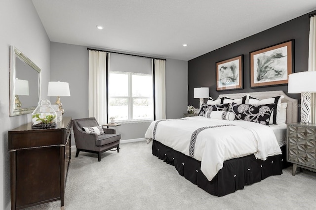 bedroom with light colored carpet