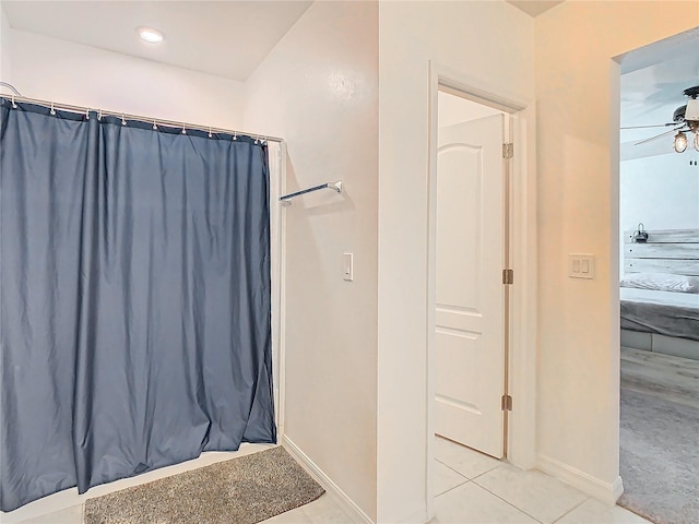 bathroom featuring tile patterned flooring and ceiling fan