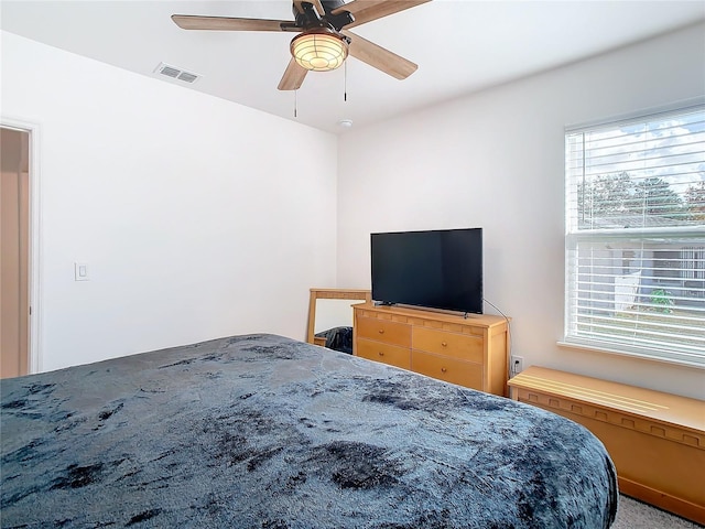 bedroom featuring carpet flooring and ceiling fan