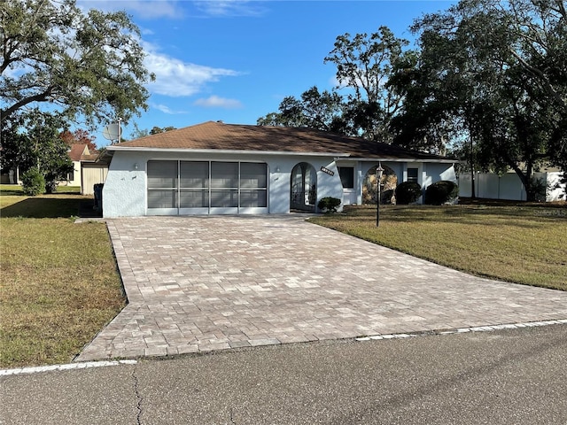 ranch-style house with a front yard