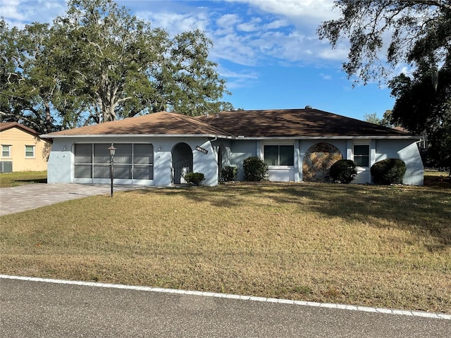 ranch-style home with a front yard