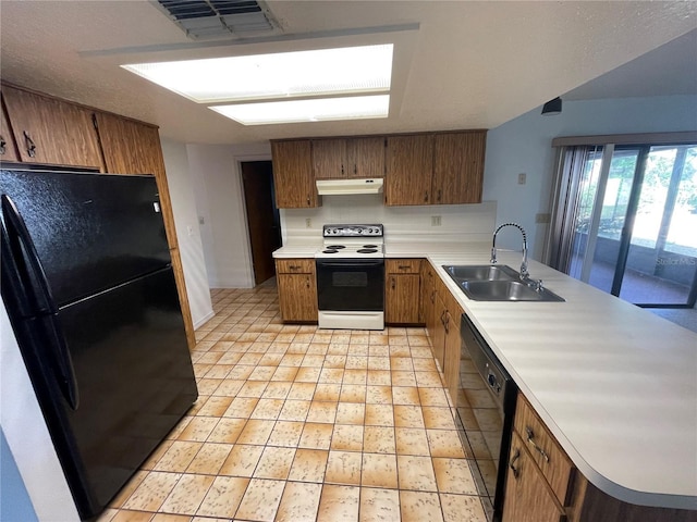 kitchen featuring black appliances and sink