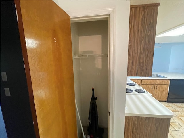 bathroom with tile patterned floors