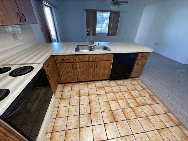 kitchen featuring kitchen peninsula, white electric range oven, light colored carpet, sink, and black dishwasher