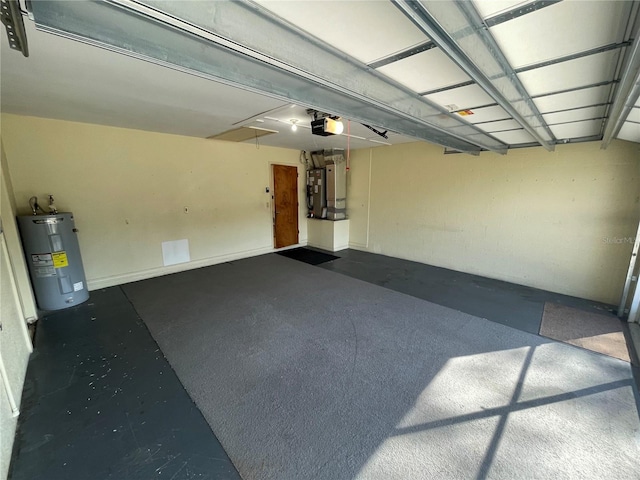 garage with electric water heater and a garage door opener