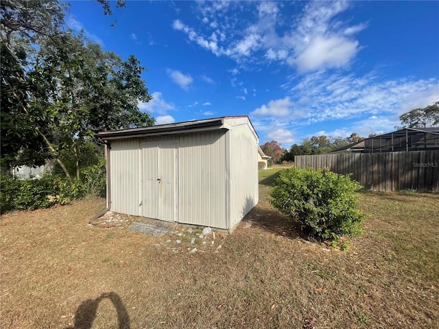 view of outdoor structure with a yard