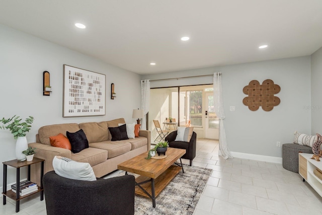 living room with light tile patterned floors and french doors